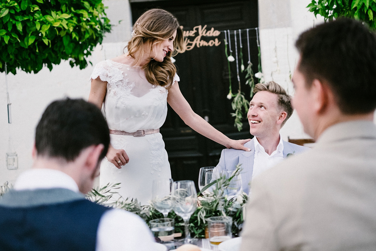 Bride Laura wears a bespoke wedding dress by Wilden Bride for her elegant destination wedding in Spain. Photography by Claudia Rose Carter.