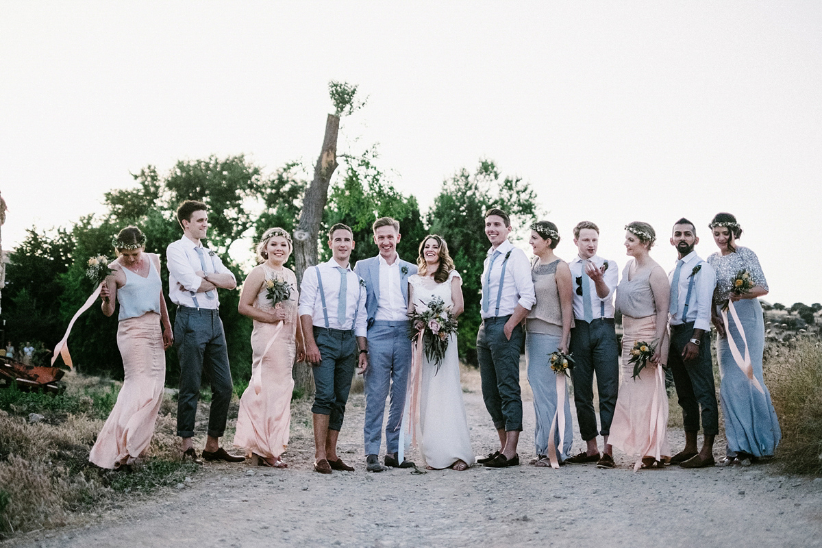 Bride Laura wears a bespoke wedding dress by Wilden Bride for her elegant destination wedding in Spain. Photography by Claudia Rose Carter.