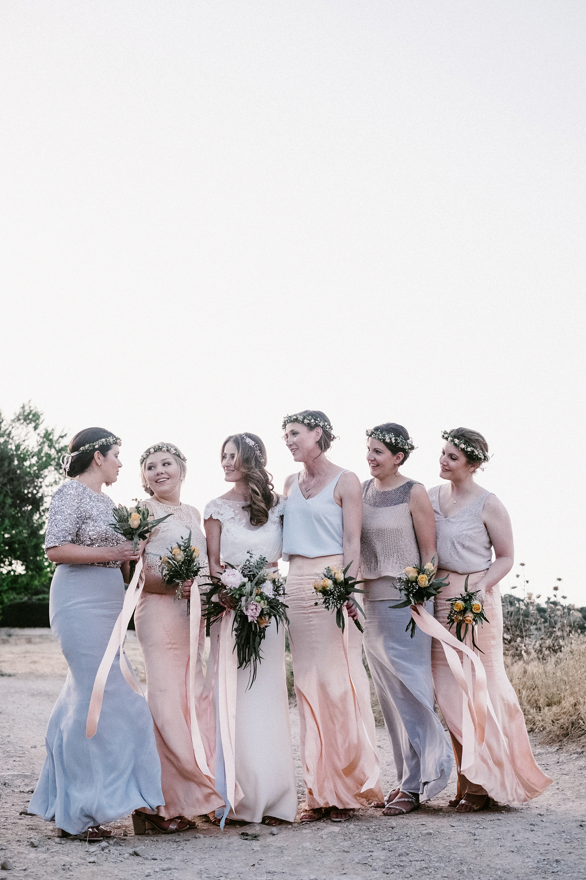 Bride Laura wears a bespoke wedding dress by Wilden Bride for her elegant destination wedding in Spain. Photography by Claudia Rose Carter.