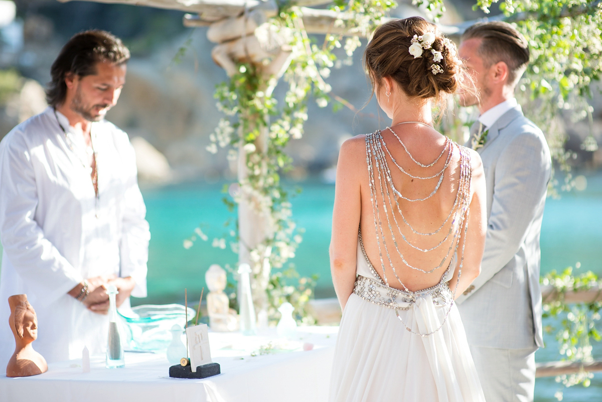 Leanne wore the Cleopatra gown by Amanda Wakeley for her spiritual and nature inspired wedding on the shores of Ibiza. Photography by Gypsy Westwood.