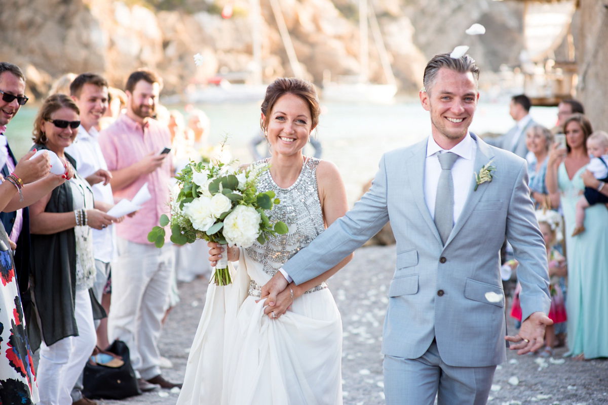 Leanne wore the Cleopatra gown by Amanda Wakeley for her spiritual and nature inspired wedding on the shores of Ibiza. Photography by Gypsy Westwood.