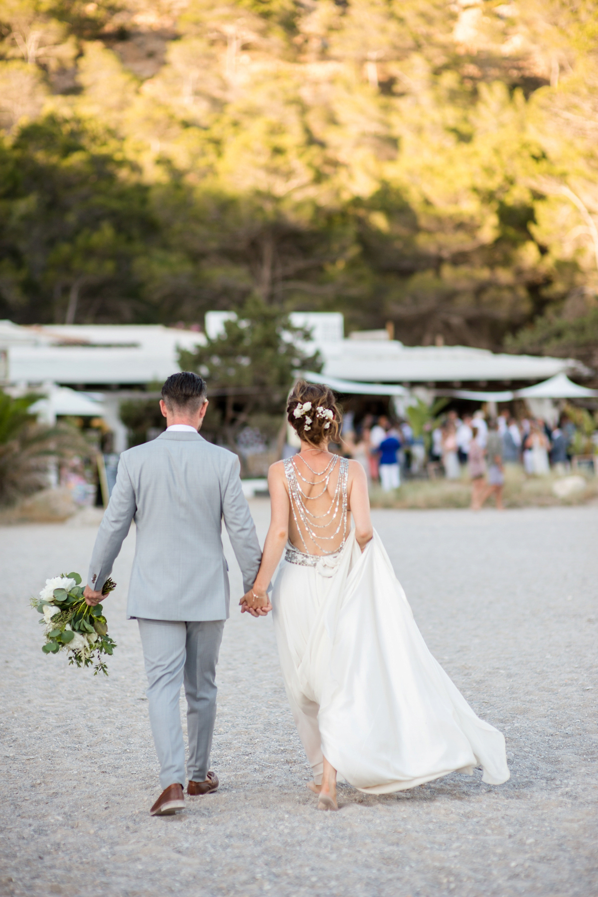 Leanne wore the Cleopatra gown by Amanda Wakeley for her spiritual and nature inspired wedding on the shores of Ibiza. Photography by Gypsy Westwood.