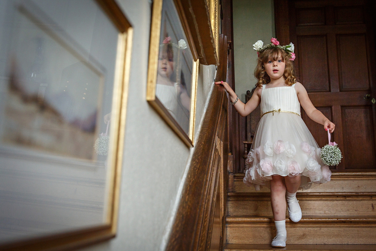 Emily wore Jenny Packham's 'Aspen' gown for her quintessentially English country house wedding in pastel shades.