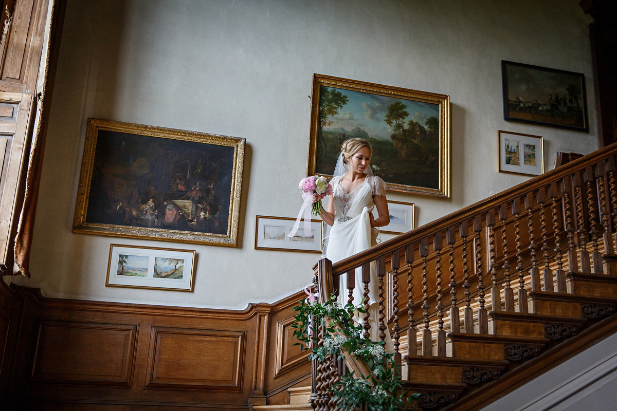 Emily wore Jenny Packham's 'Aspen' gown for her quintessentially English country house wedding in pastel shades.