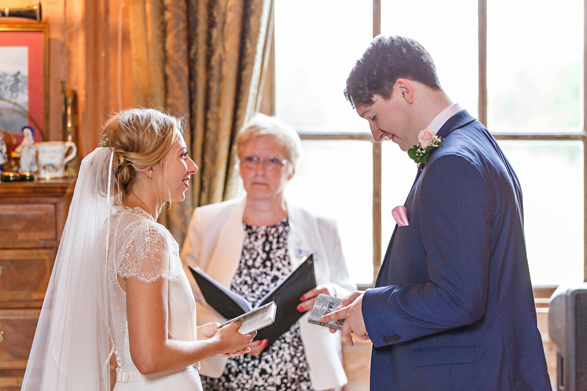 Emily wore Jenny Packham's 'Aspen' gown for her quintessentially English country house wedding in pastel shades.