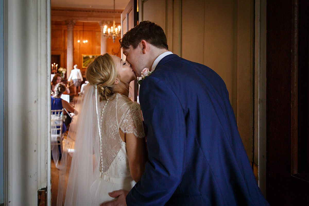 Emily wore Jenny Packham's 'Aspen' gown for her quintessentially English country house wedding in pastel shades.