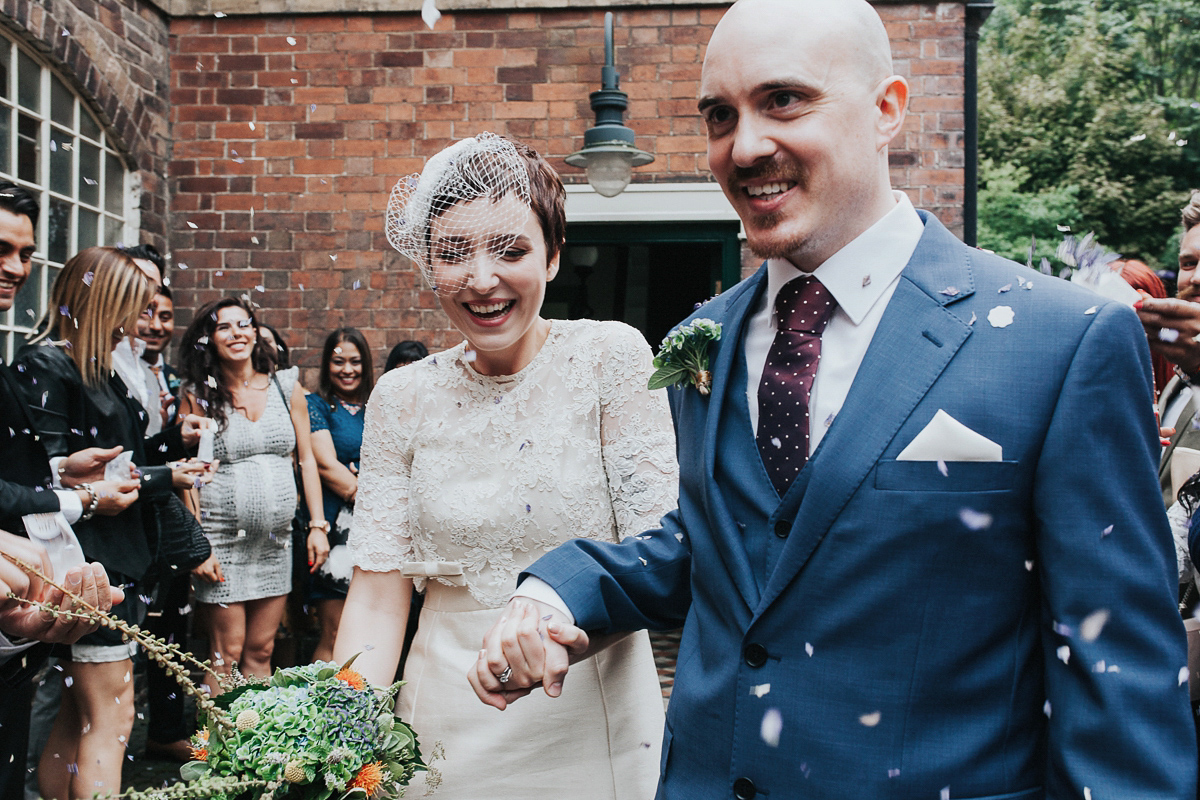 A short wedding dress and birdcage veil for a 1960's inspired bride. Image by Indie Photography.