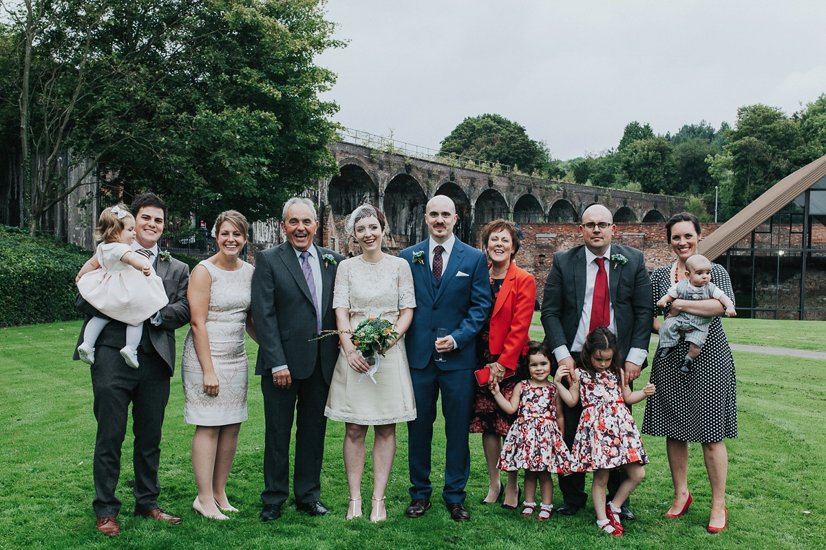 A short wedding dress and birdcage veil for a 1960's inspired bride. Image by Indie Photography.