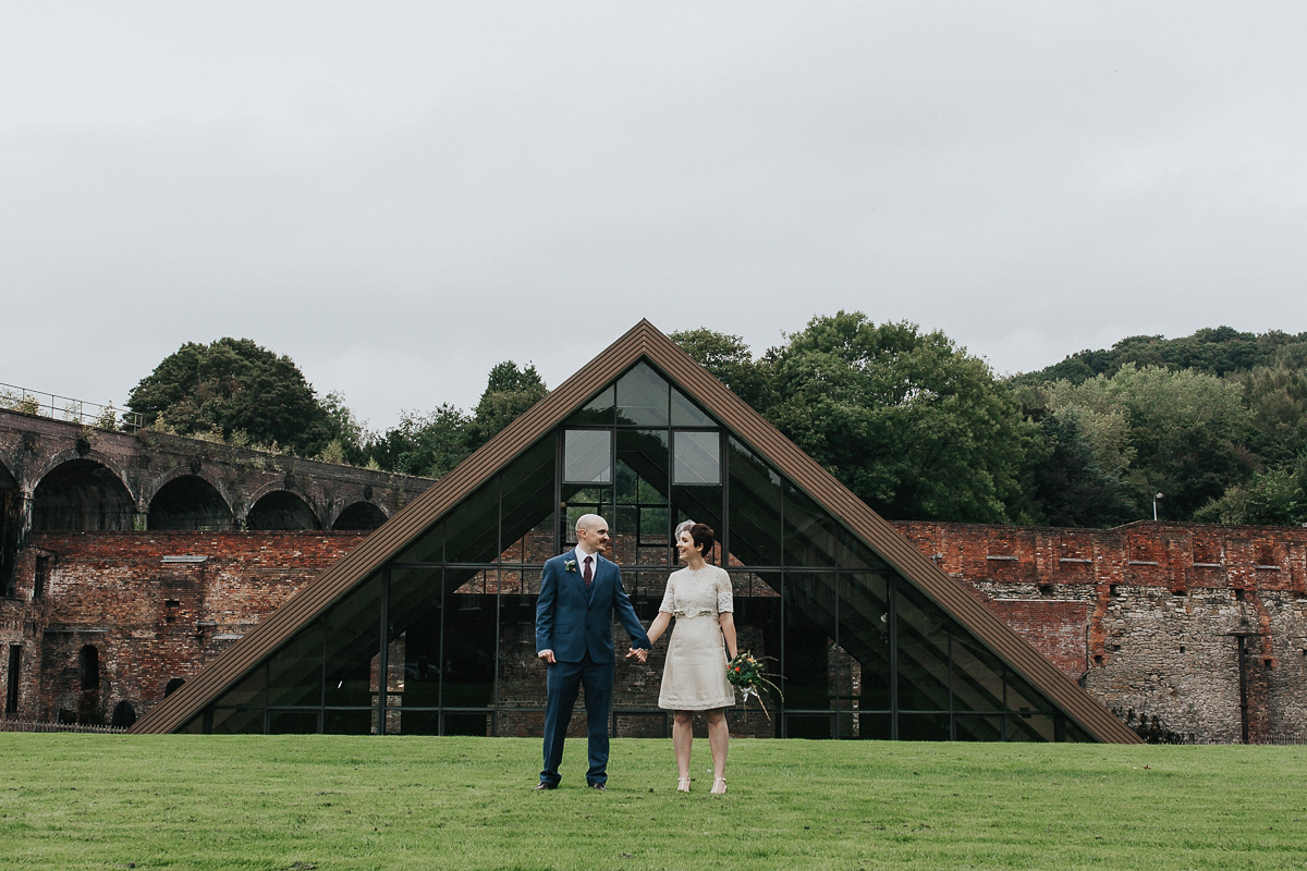 A short wedding dress and birdcage veil for a 1960's inspired bride. Image by Indie Photography.