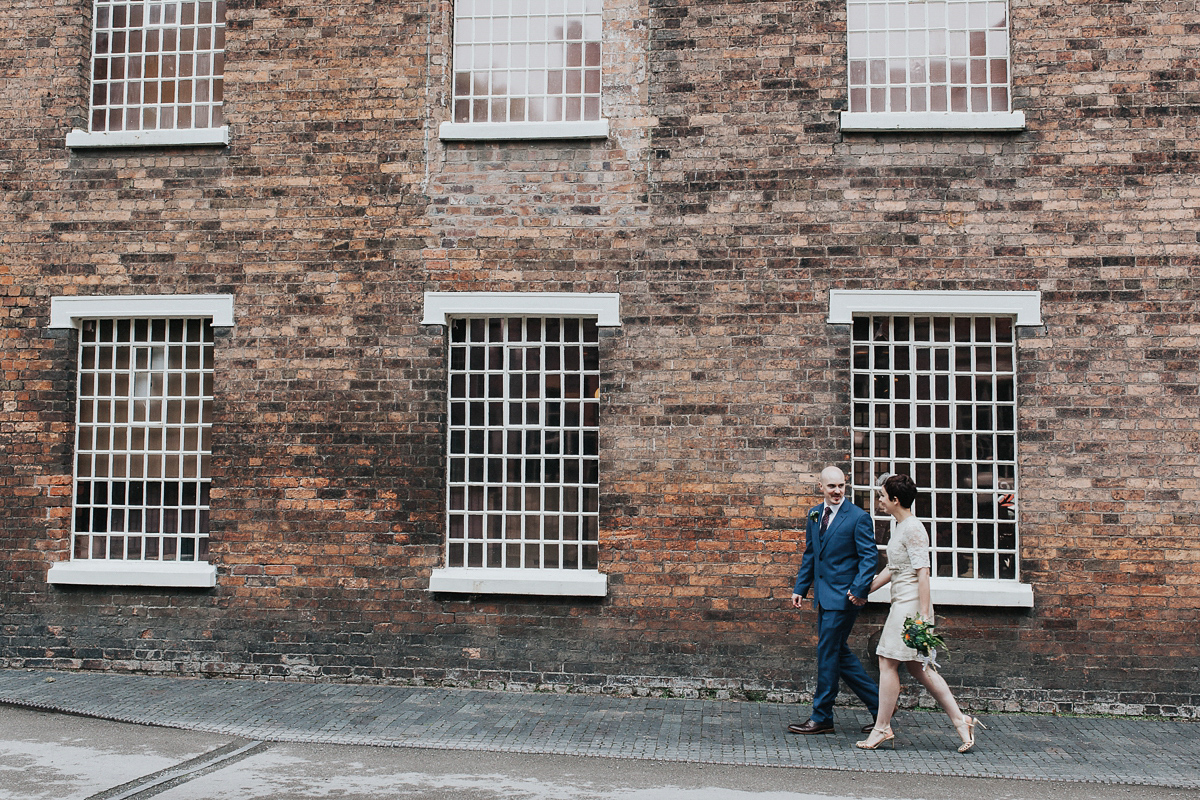 A short wedding dress and birdcage veil for a 1960's inspired bride. Image by Indie Photography.