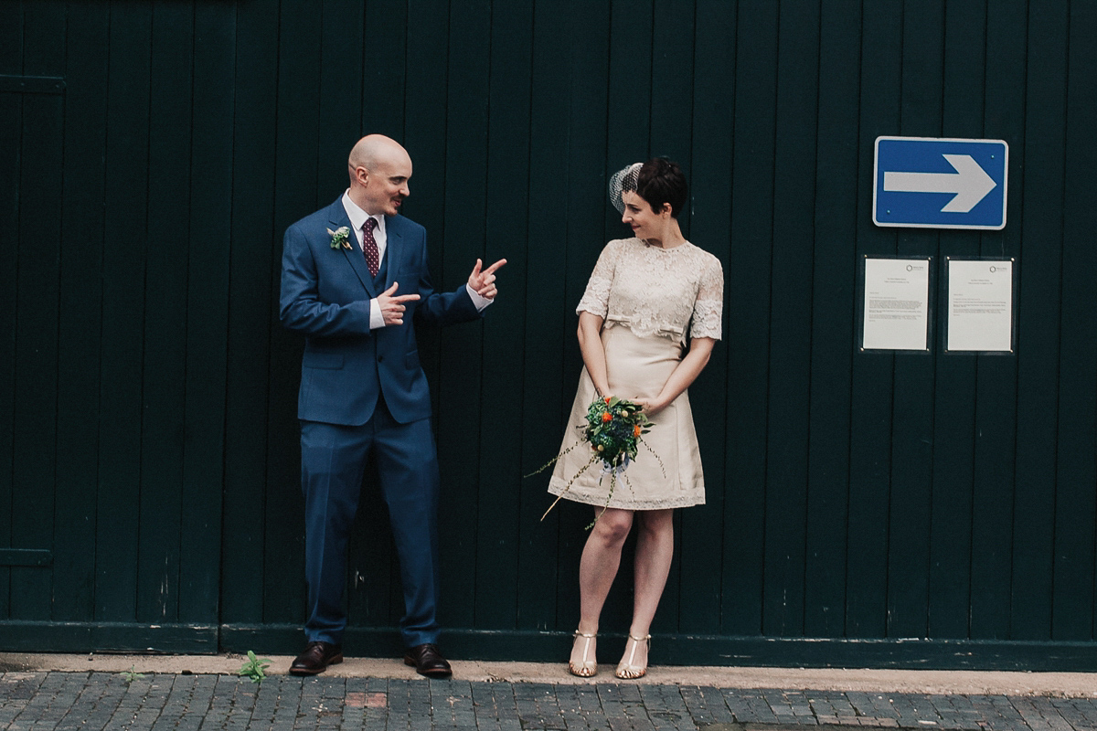 A short wedding dress and birdcage veil for a 1960's inspired bride. Image by Indie Photography.