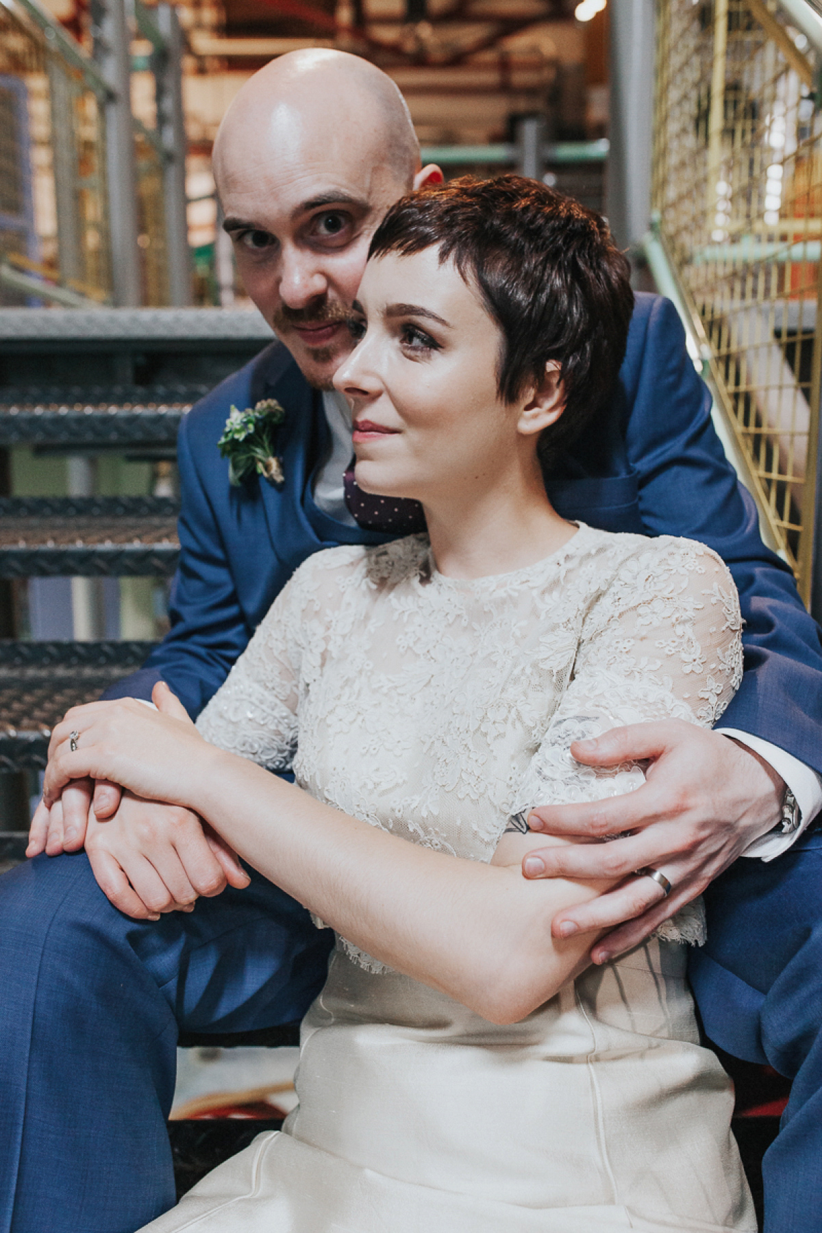 A short wedding dress and birdcage veil for a 1960's inspired bride. Image by Indie Photography.