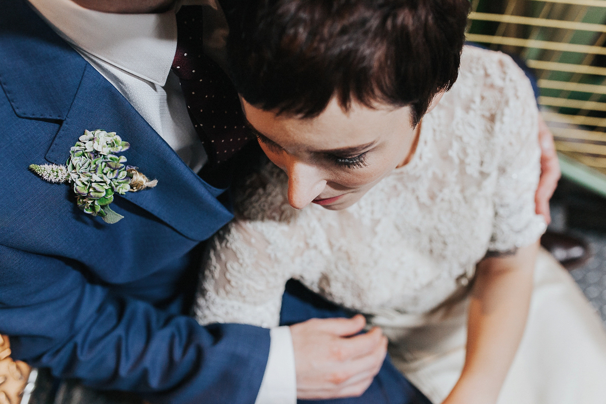 A short wedding dress and birdcage veil for a 1960's inspired bride. Image by Indie Photography.