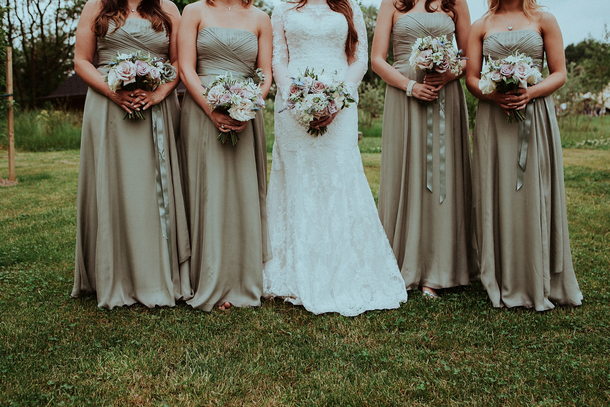 Alice wore an Essense of Australia gown for her rustic teepee wedding in North Yorkshire. Scandi teepees provided by Papakata, photography by Shutter Go Click.