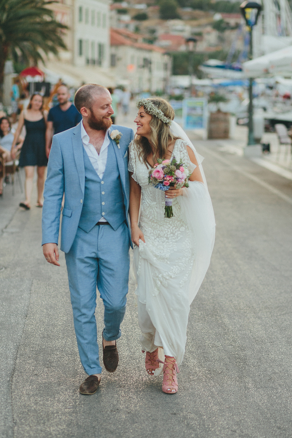 Bride Tamar wears an embellished Eliza Jane Howell gown and crown of gypsophila for her Croatian Island wedding. Photography by Petar Jurica.