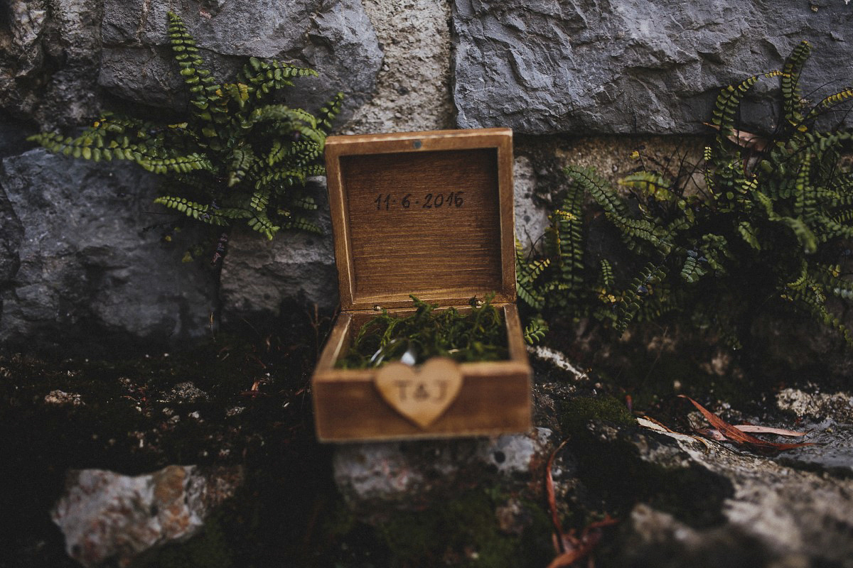 Tjaša wore a black lace and tulle gown by Alexandre Grecco for her nature inspired, minimalist castle wedding in Slovenia. Photography by That Happy Day.