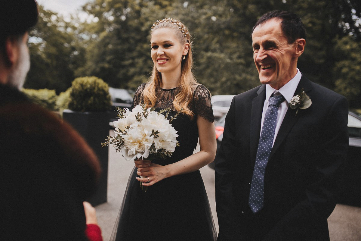 Tjaša wore a black lace and tulle gown by Alexandre Grecco for her nature inspired, minimalist castle wedding in Slovenia. Photography by That Happy Day.