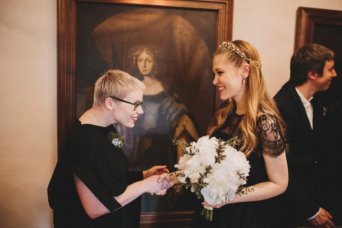 Tjaša wore a black lace and tulle gown by Alexandre Grecco for her nature inspired, minimalist castle wedding in Slovenia. Photography by That Happy Day.