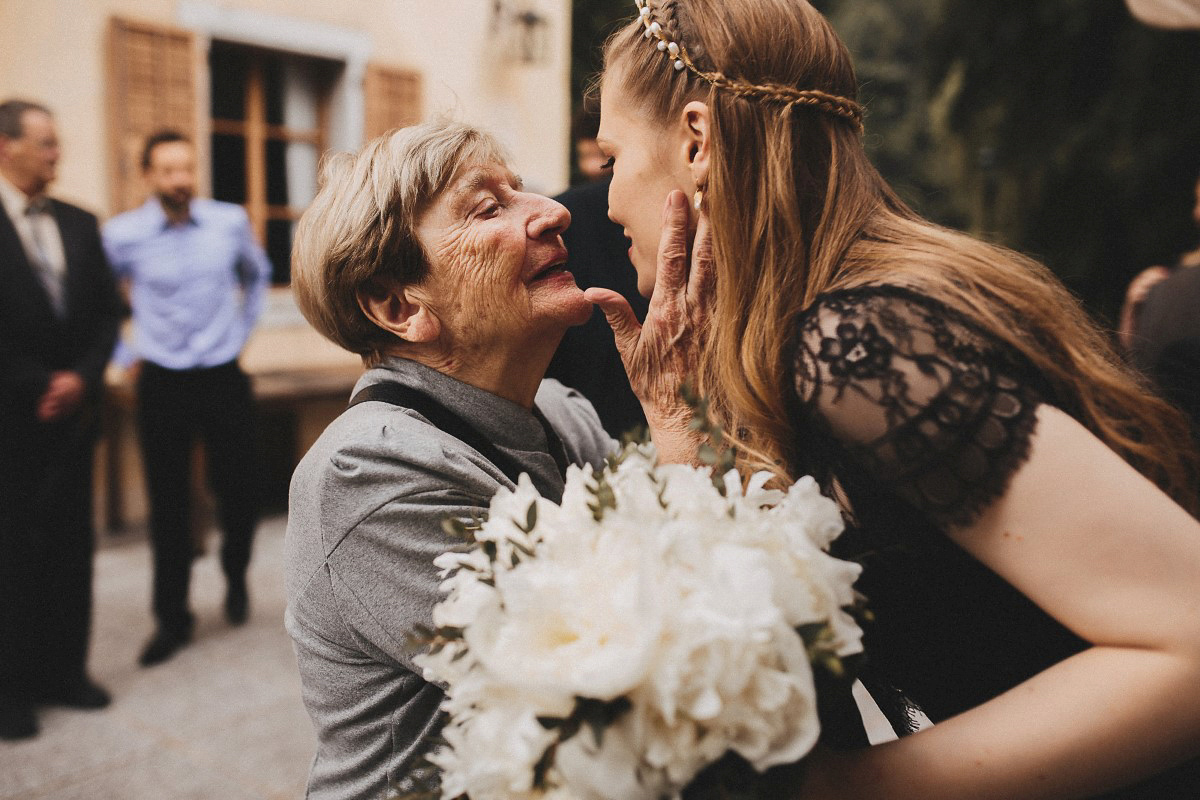 Tjaša wore a black lace and tulle gown by Alexandre Grecco for her nature inspired, minimalist castle wedding in Slovenia. Photography by That Happy Day.