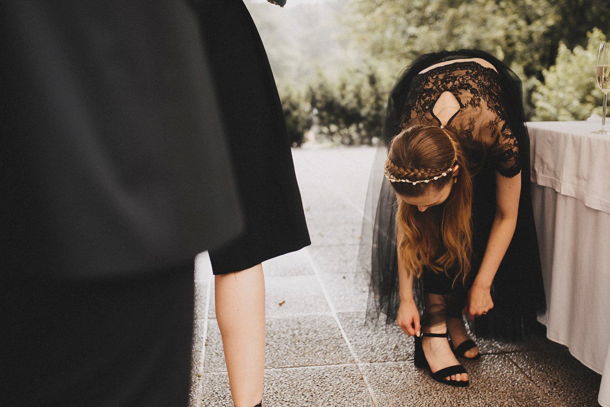 Tjaša wore a black lace and tulle gown by Alexandre Grecco for her nature inspired, minimalist castle wedding in Slovenia. Photography by That Happy Day.