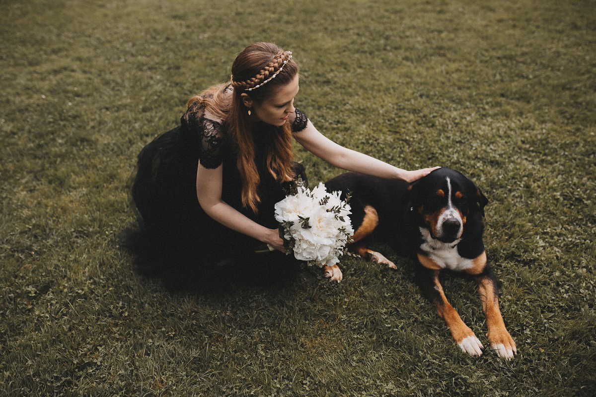 Tjaša wore a black lace and tulle gown by Alexandre Grecco for her nature inspired, minimalist castle wedding in Slovenia. Photography by That Happy Day.