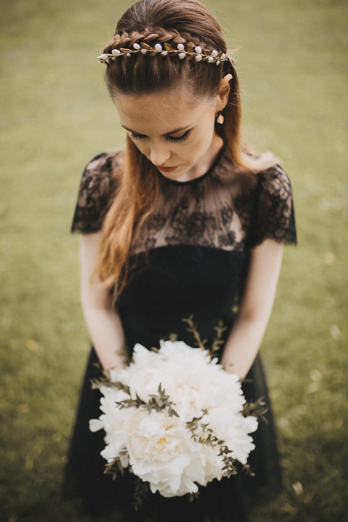 Tjaša wore a black lace and tulle gown by Alexandre Grecco for her nature inspired, minimalist castle wedding in Slovenia. Photography by That Happy Day.