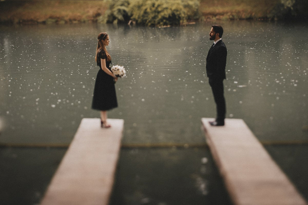 Tjaša wore a black lace and tulle gown by Alexandre Grecco for her nature inspired, minimalist castle wedding in Slovenia. Photography by That Happy Day.