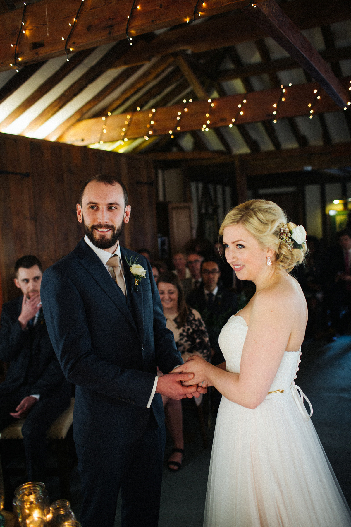 Zena and Tom's woodland glam inspired wedding was held in a beautiful barn in the spring time. Photography by Claudia Rose Carter.