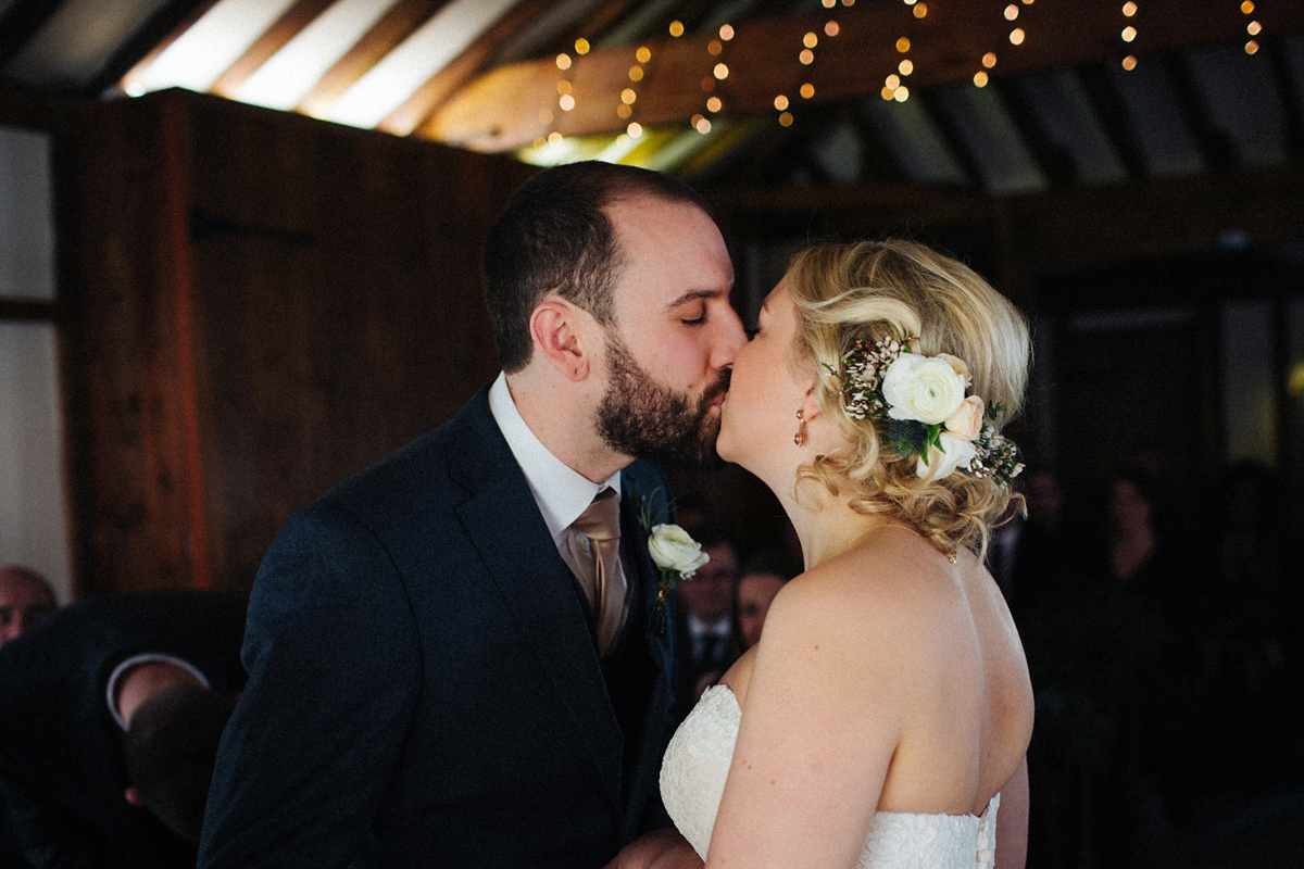 Zena and Tom's woodland glam inspired wedding was held in a beautiful barn in the spring time. Photography by Claudia Rose Carter.