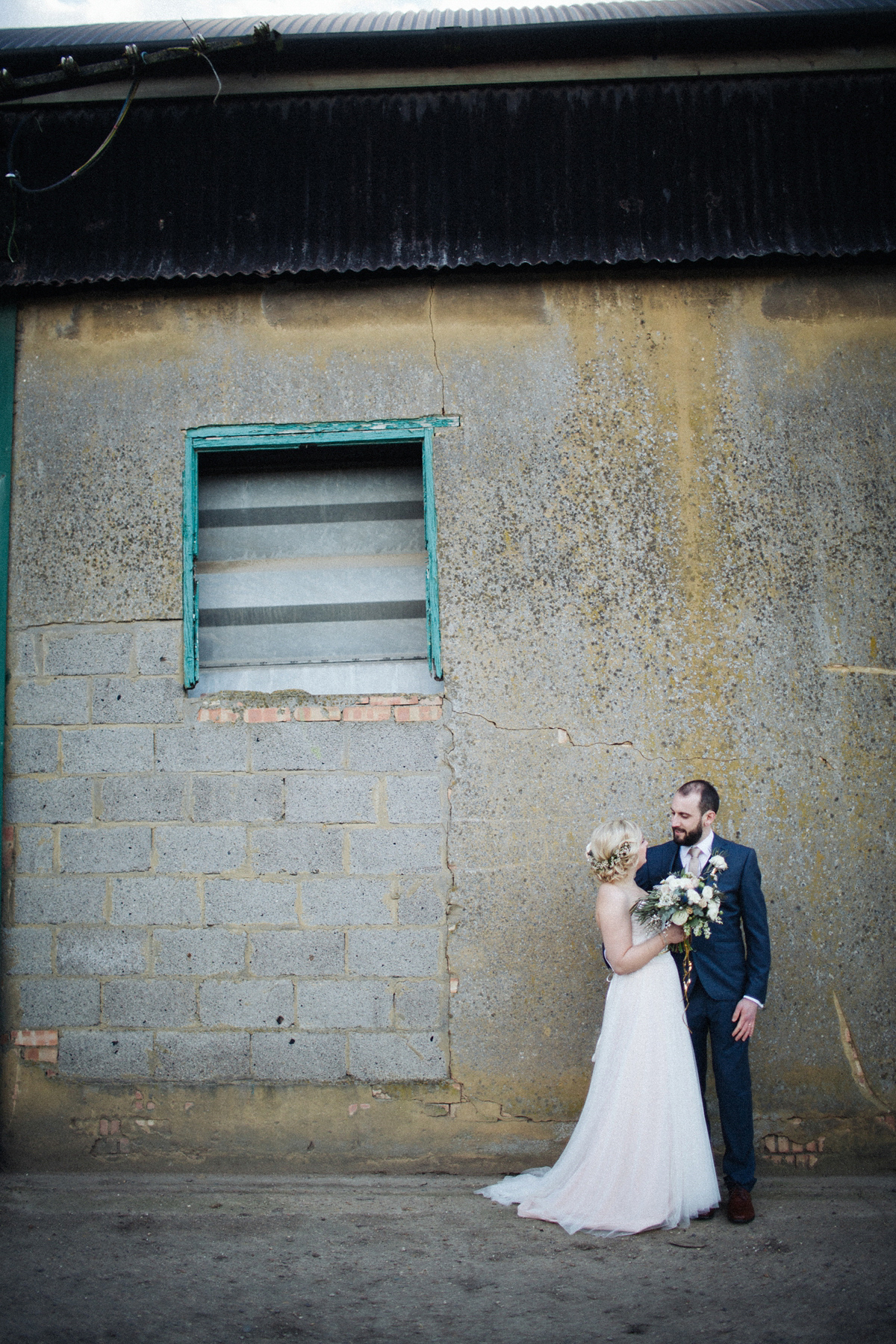 Zena and Tom's woodland glam inspired wedding was held in a beautiful barn in the spring time. Photography by Claudia Rose Carter.