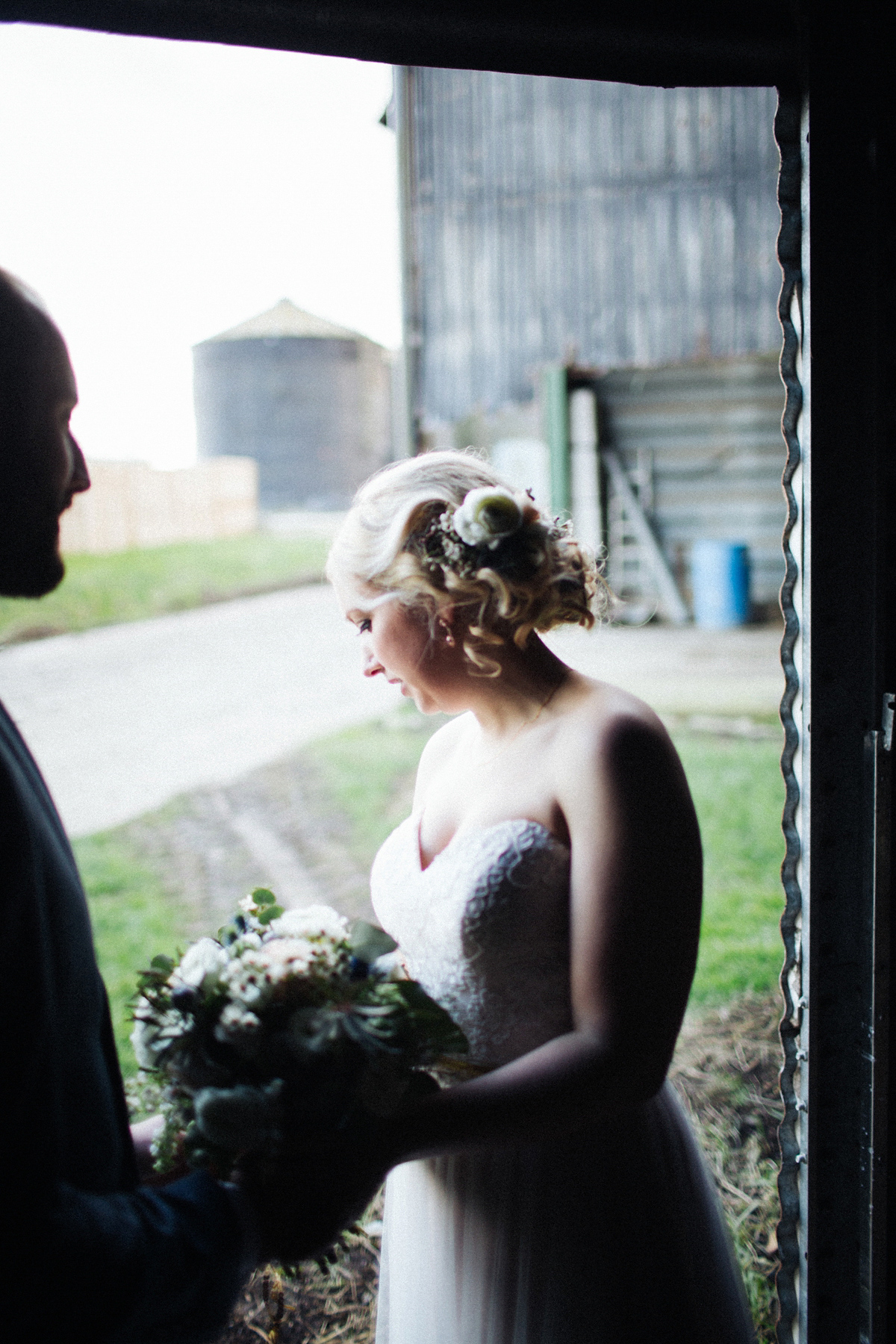 Zena and Tom's woodland glam inspired wedding was held in a beautiful barn in the spring time. Photography by Claudia Rose Carter.