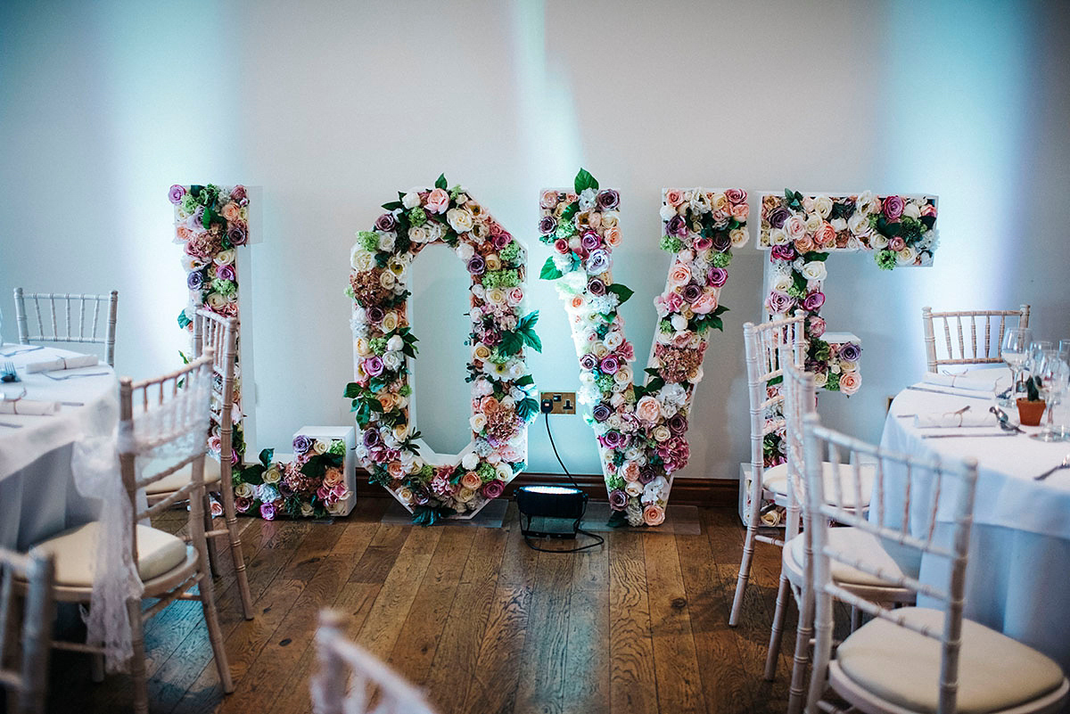 Jade wore a Sottero & Midgley gown for her boho inspired barbeque weeding. Photography by Kerry Woods.