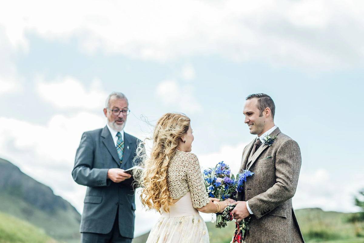 Bride Tatiana wore the Ireland gown by BHLDN for her Scottish elopement. Photography by Carley Buick.
