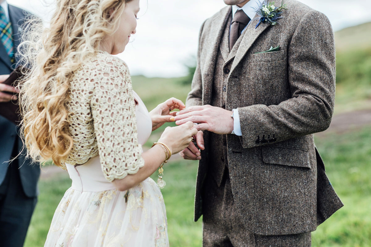 Bride Tatiana wore the Ireland gown by BHLDN for her Scottish elopement. Photography by Carley Buick.