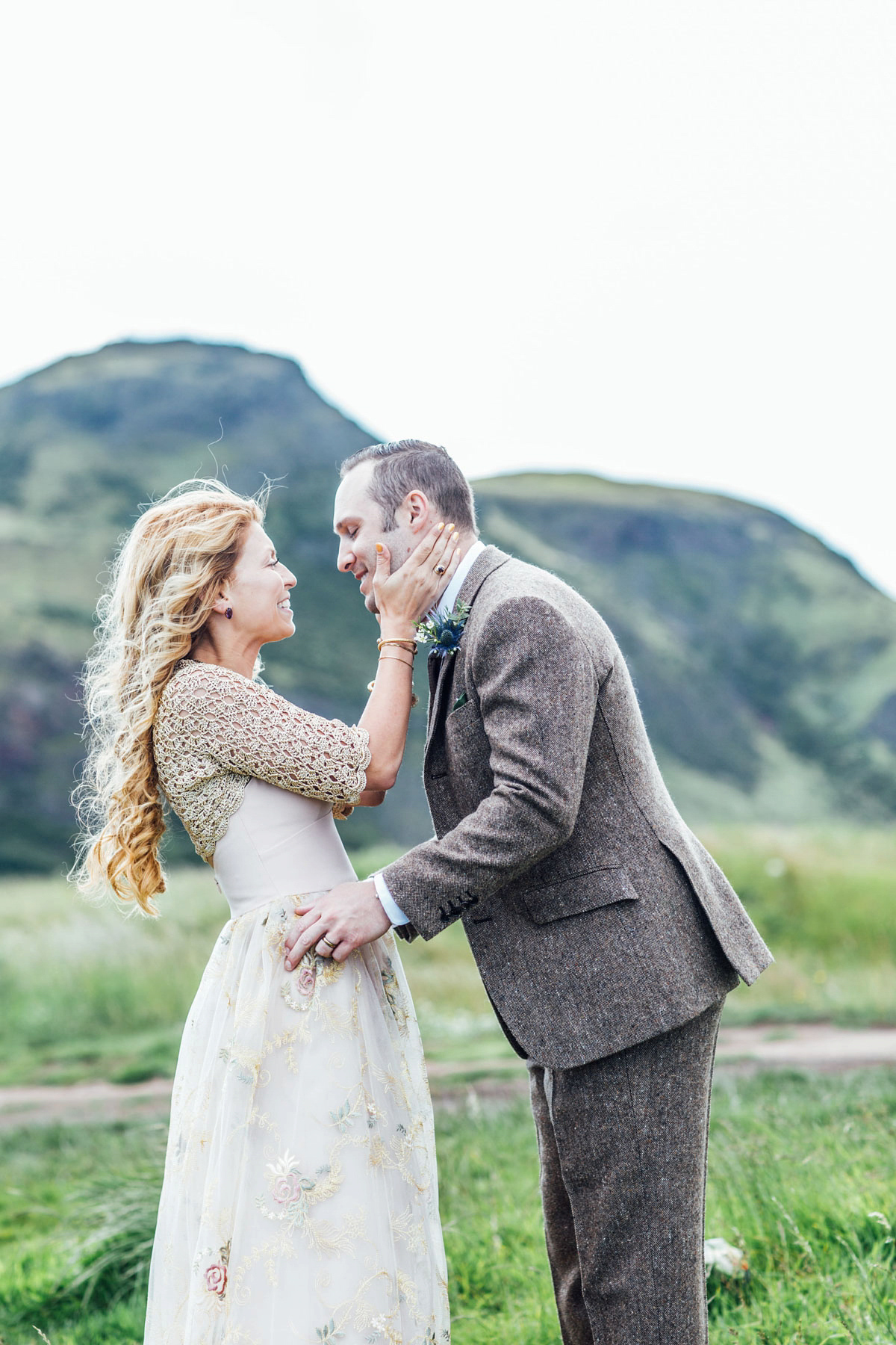 Bride Tatiana wore the Ireland gown by BHLDN for her Scottish elopement. Photography by Carley Buick.