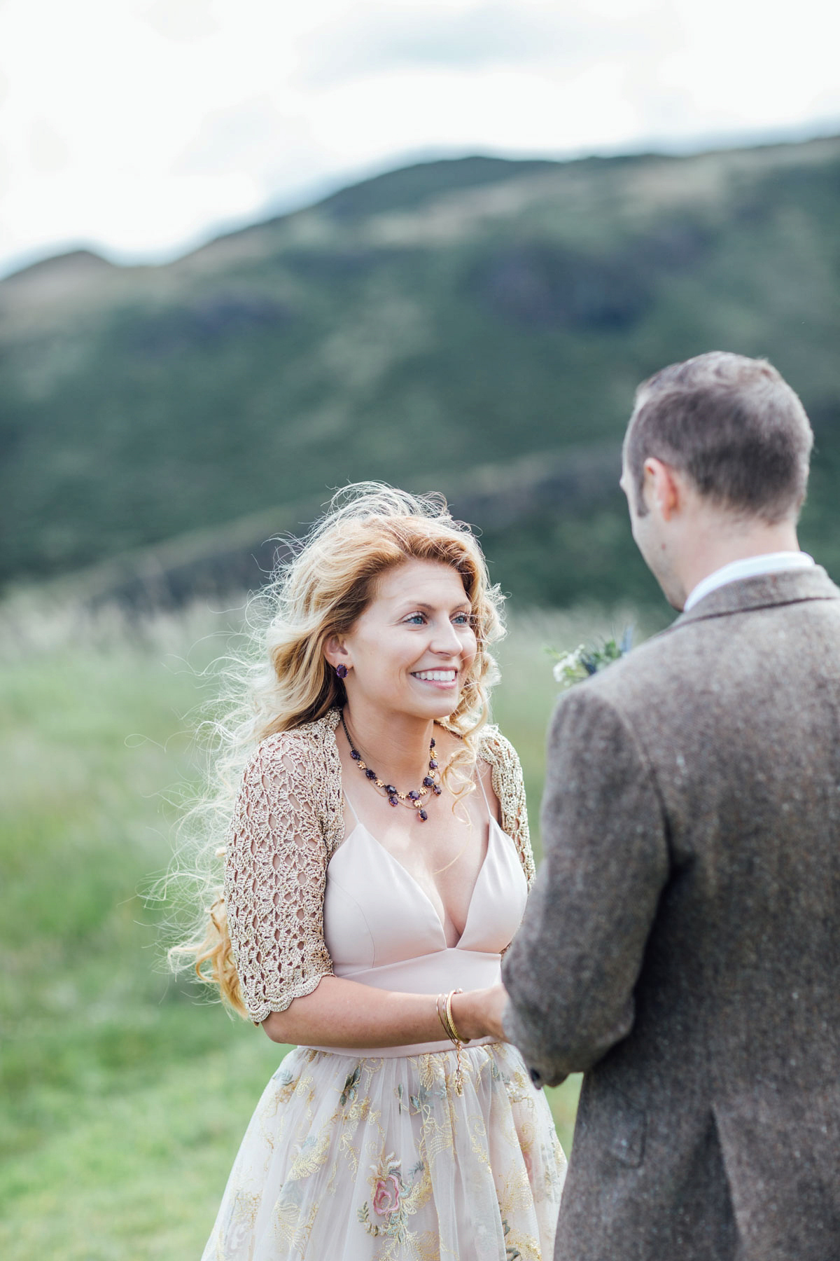 Bride Tatiana wore the Ireland gown by BHLDN for her Scottish elopement. Photography by Carley Buick.