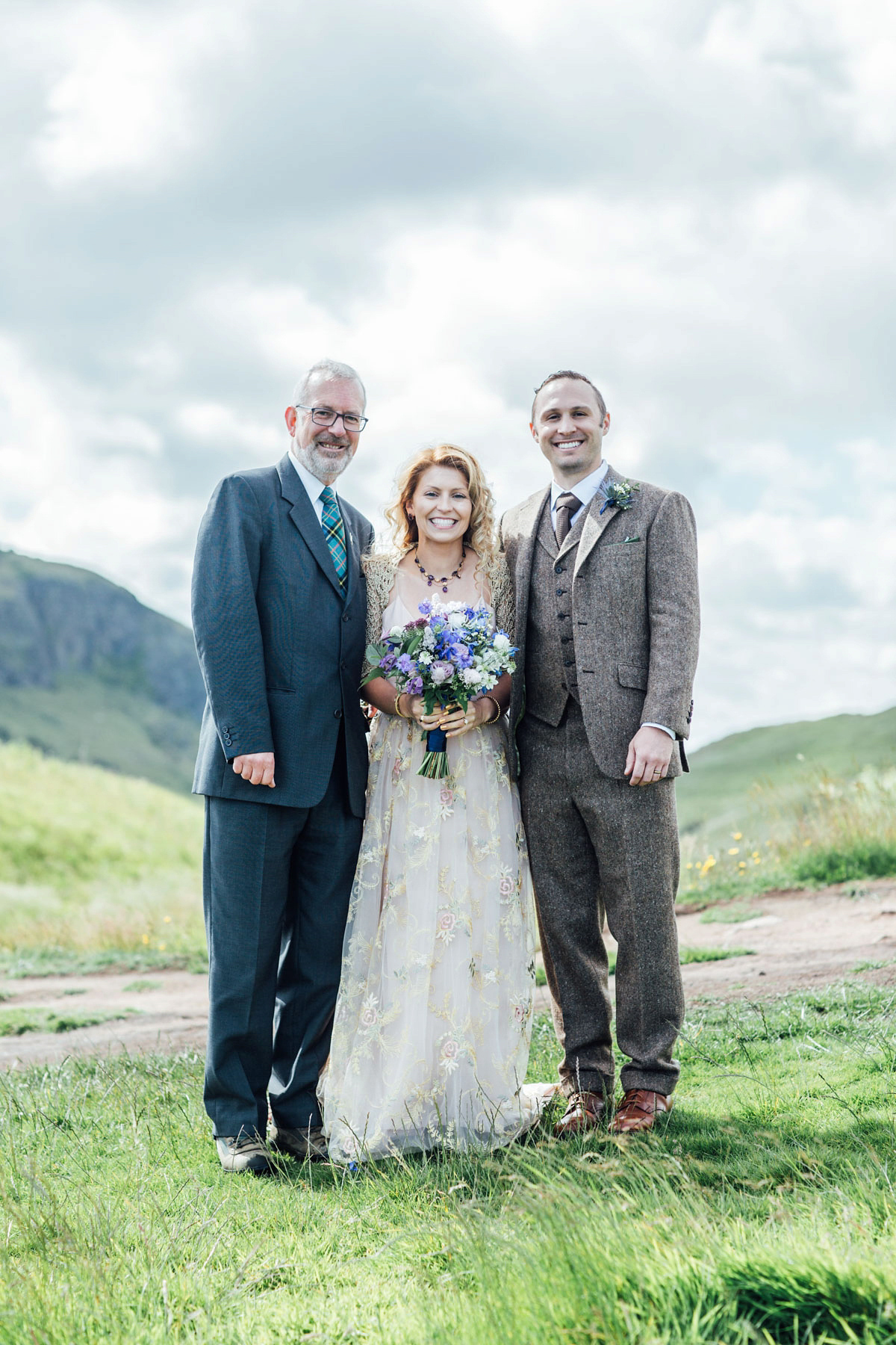 Bride Tatiana wore the Ireland gown by BHLDN for her Scottish elopement. Photography by Carley Buick.