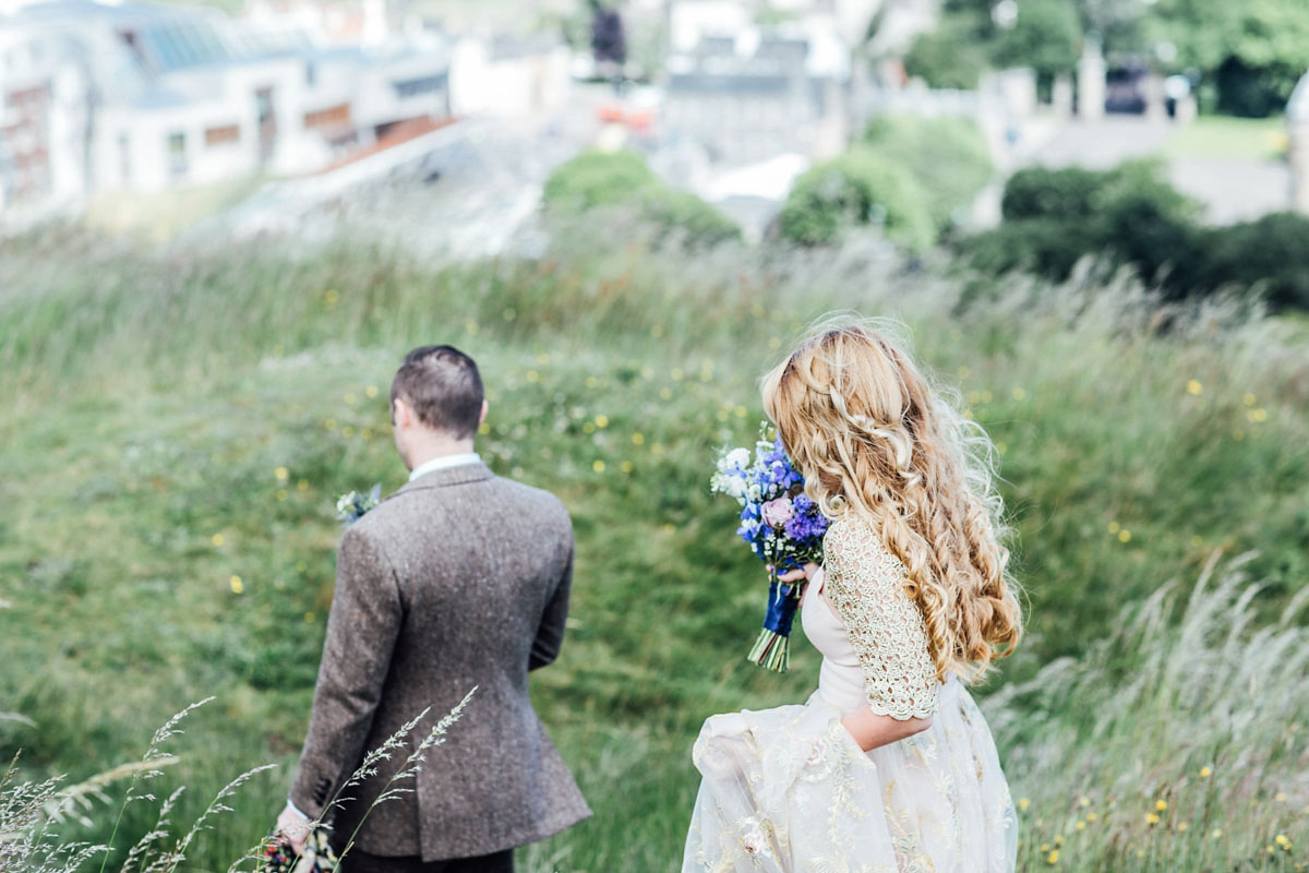 Bride Tatiana wore the Ireland gown by BHLDN for her Scottish elopement. Photography by Carley Buick.