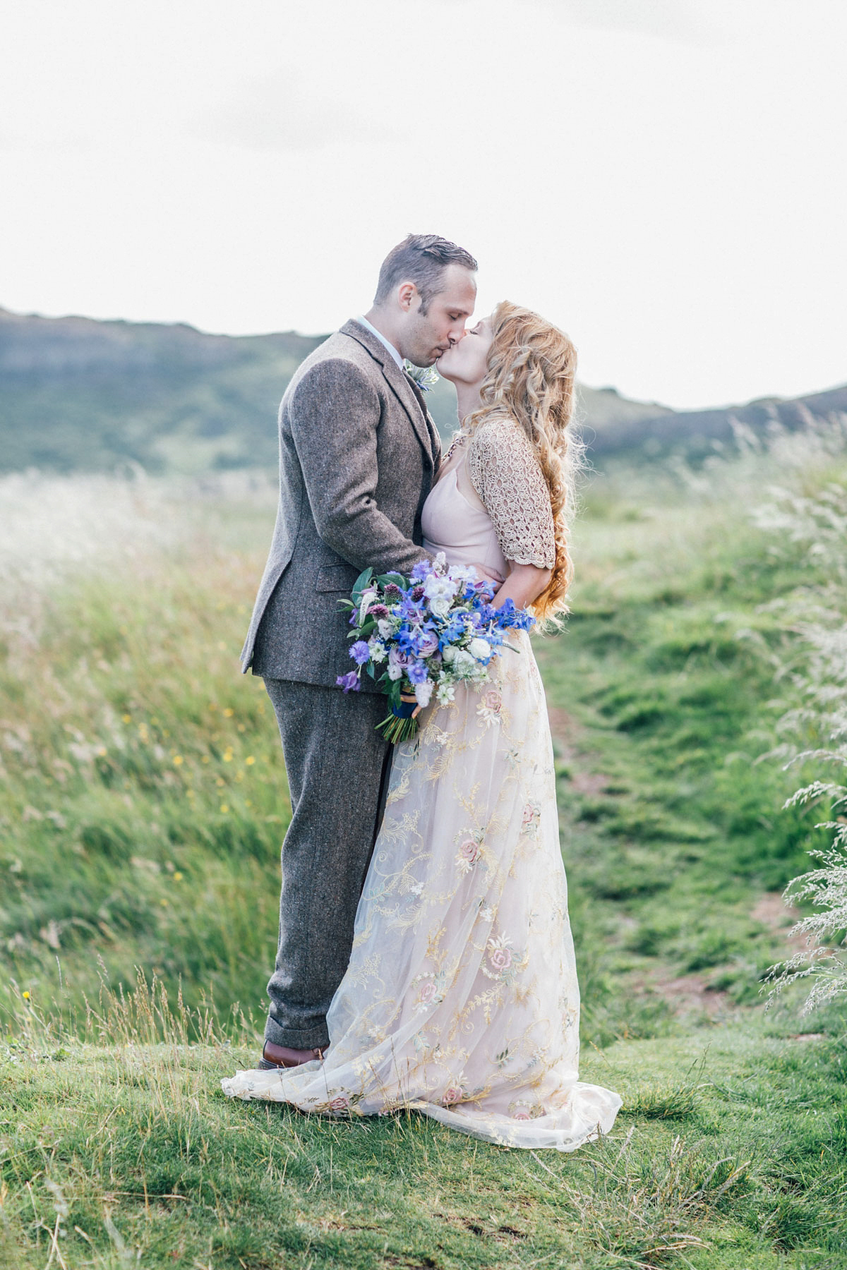 Bride Tatiana wore the Ireland gown by BHLDN for her Scottish elopement. Photography by Carley Buick.