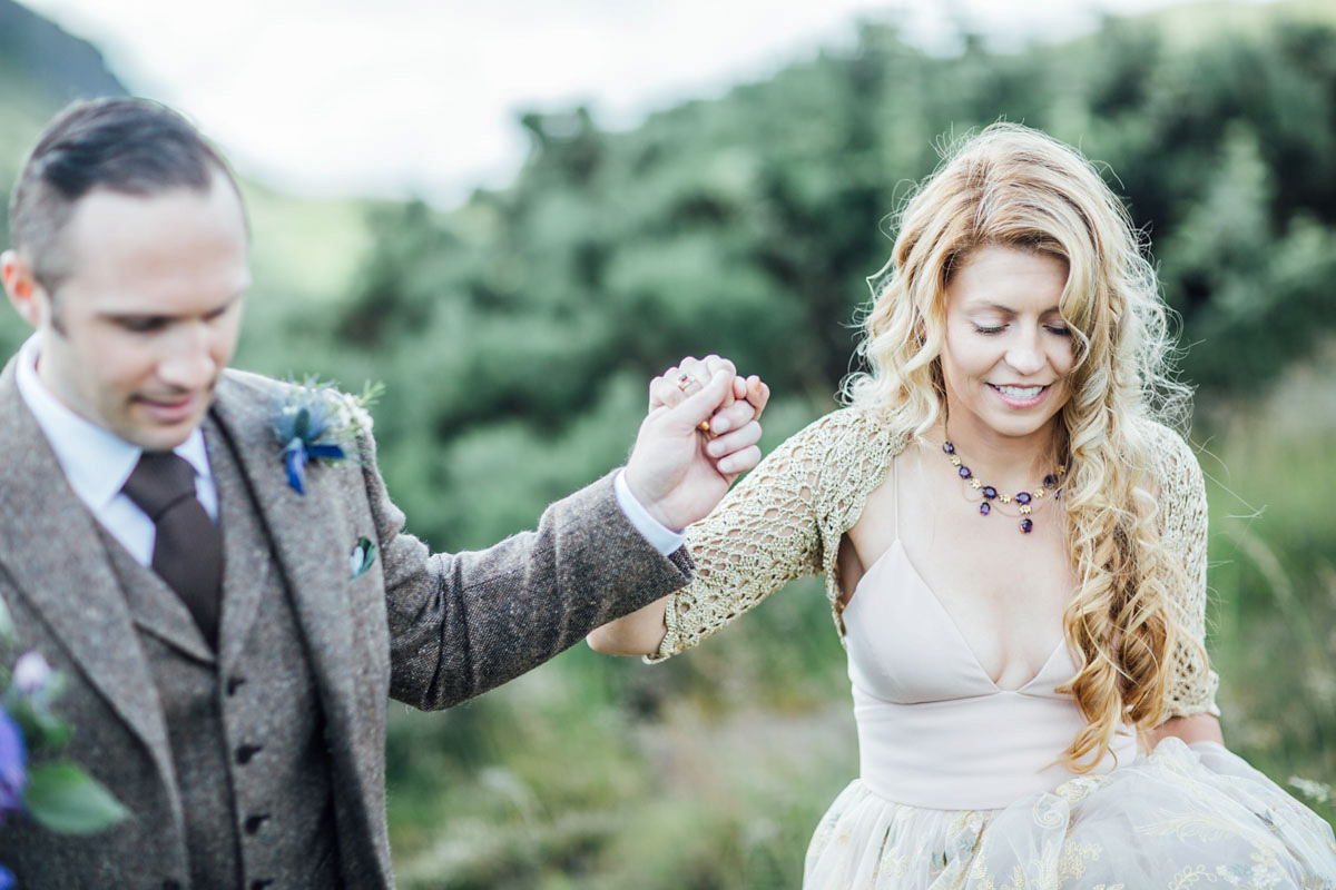 Bride Tatiana wore the Ireland gown by BHLDN for her Scottish elopement. Photography by Carley Buick.