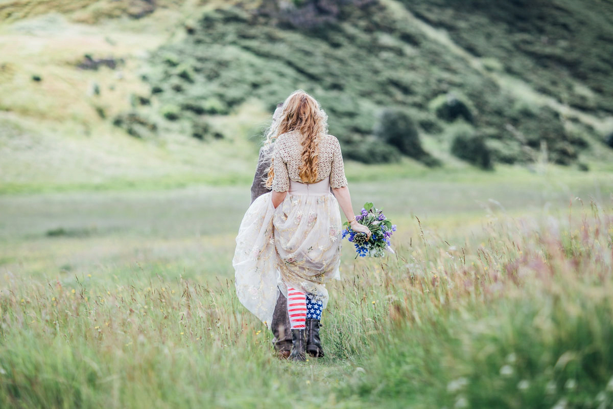 Bride Tatiana wore the Ireland gown by BHLDN for her Scottish elopement. Photography by Carley Buick.