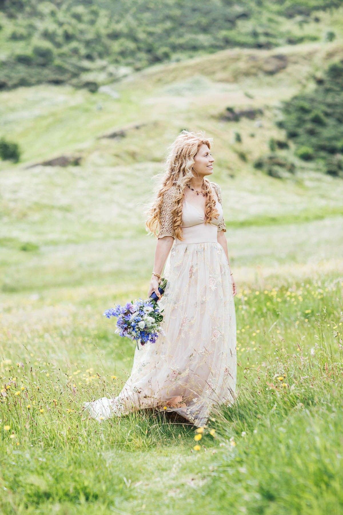 Bride Tatiana wore the Ireland gown by BHLDN for her Scottish elopement. Photography by Carley Buick.