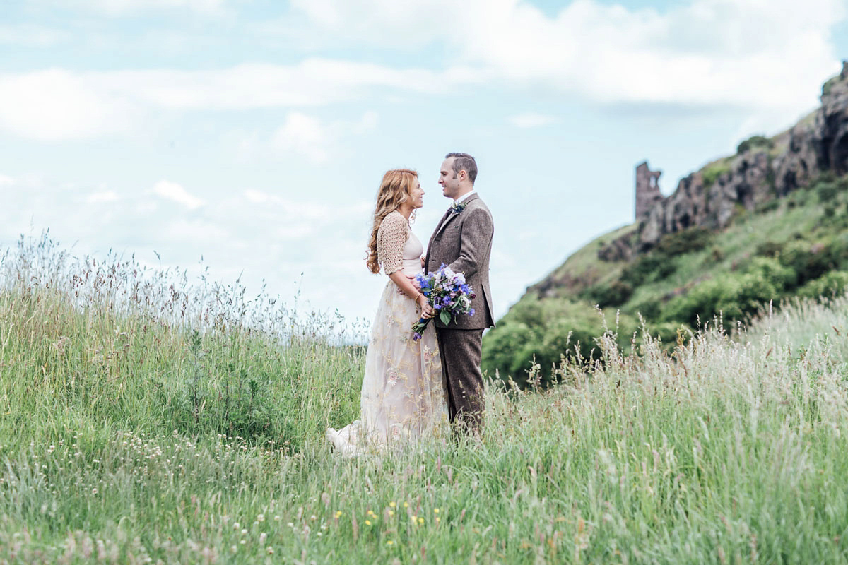 Bride Tatiana wore the Ireland gown by BHLDN for her Scottish elopement. Photography by Carley Buick.