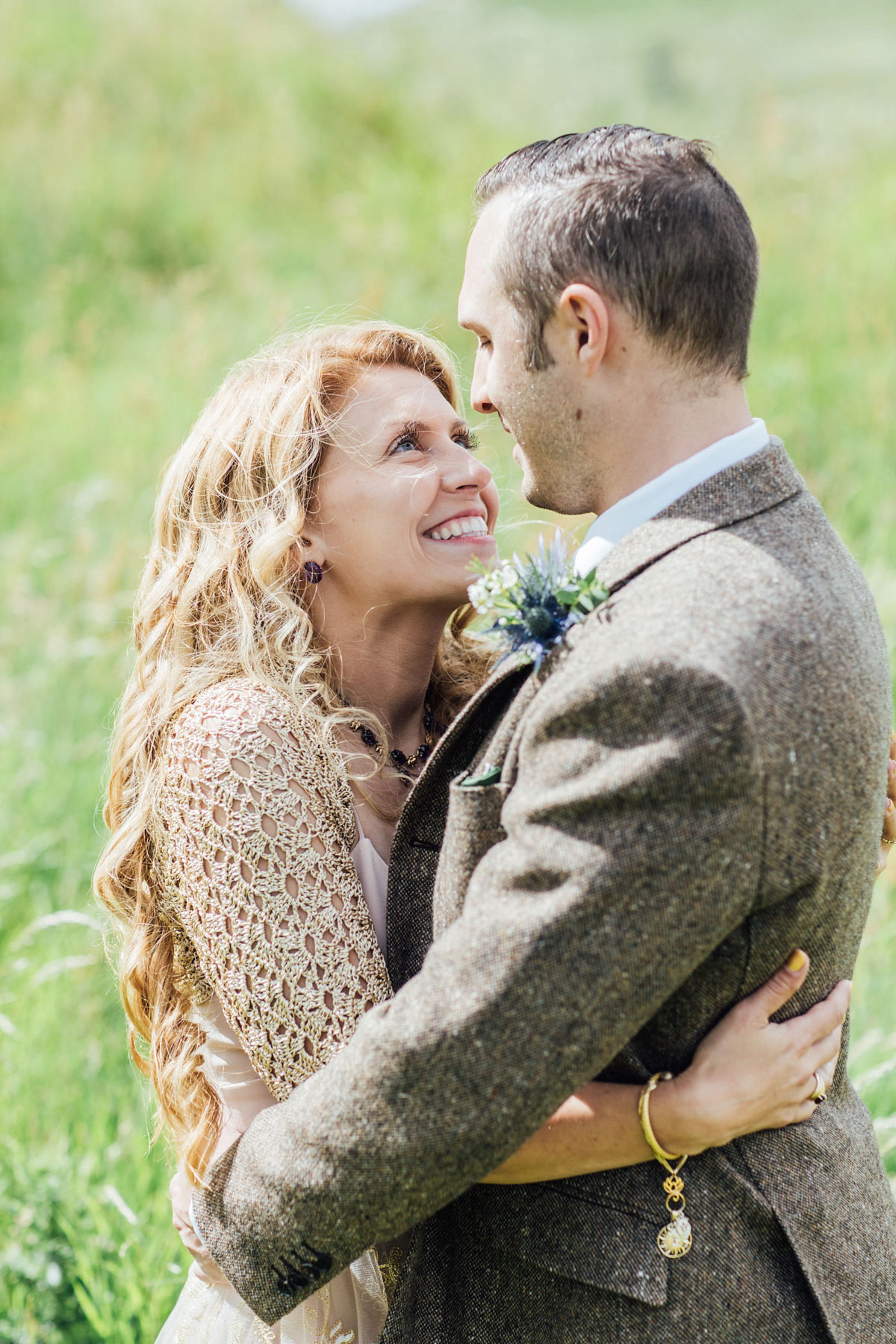 Bride Tatiana wore the Ireland gown by BHLDN for her Scottish elopement. Photography by Carley Buick.