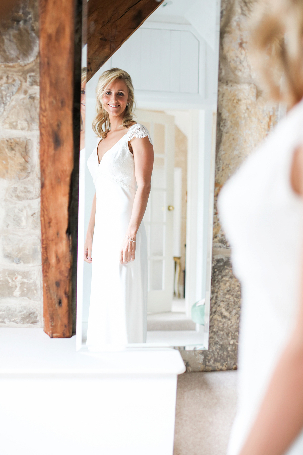 Sophie wore a Sassi Holford gown for her romantic English country garden wedding in pastel shades. Captured by Amy Fanton Photography.