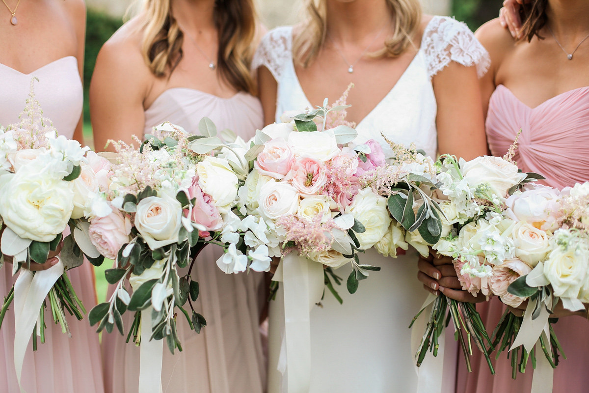 Sophie wore a Sassi Holford gown for her romantic English country garden wedding in pastel shades. Captured by Amy Fanton Photography.