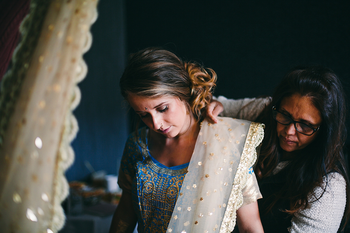 Sabrina and Nick had a multicultural wedding including an Anglican and Hindu ceremony at Syon Park in London. Sabrina wore Pronovias. Photography by Viva La weddings.