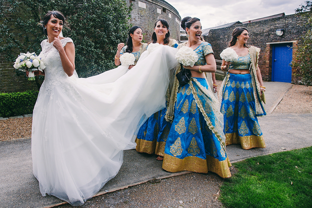 Sabrina and Nick had a multicultural wedding including an Anglican and Hindu ceremony at Syon Park in London. Sabrina wore Pronovias. Photography by Viva La weddings.