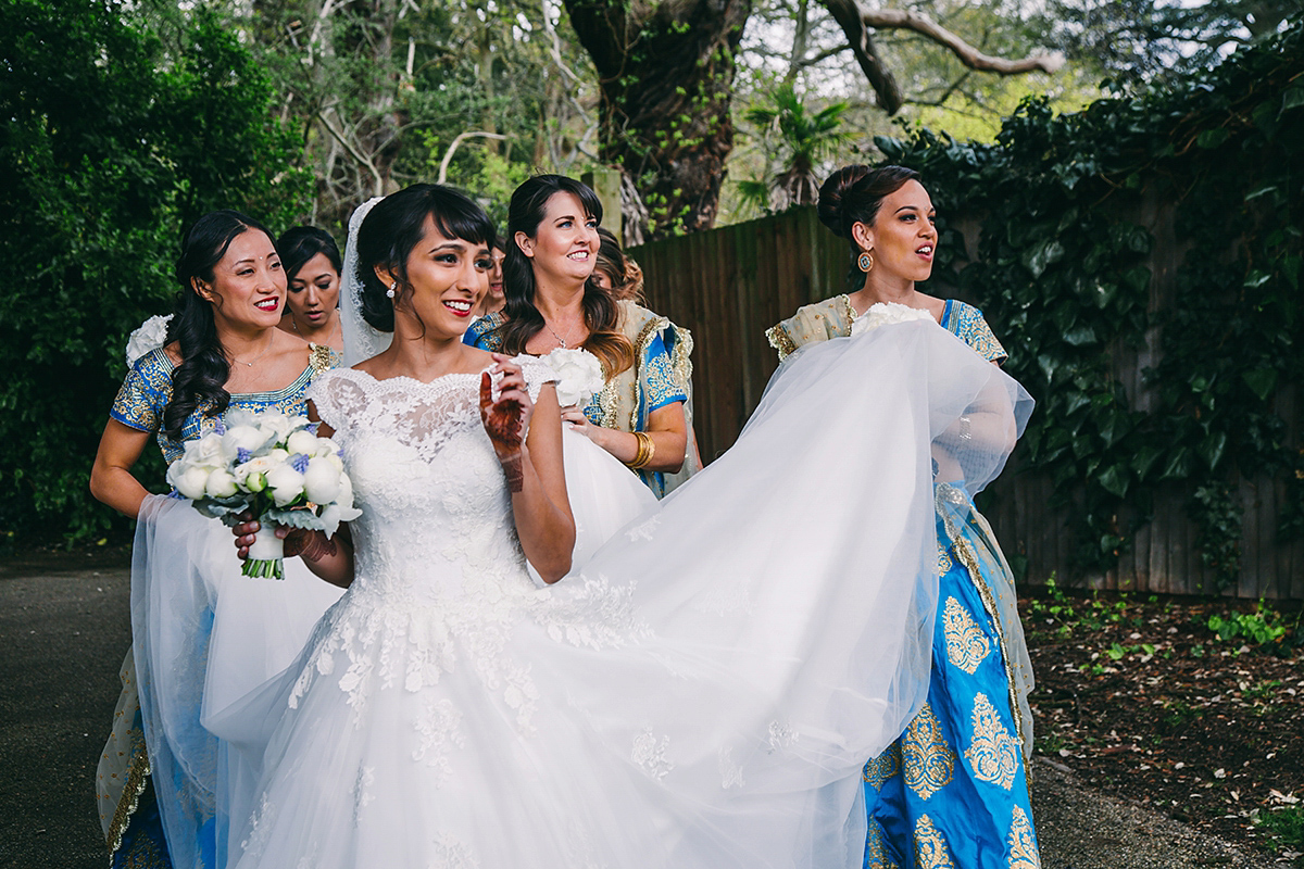 Sabrina and Nick had a multicultural wedding including an Anglican and Hindu ceremony at Syon Park in London. Sabrina wore Pronovias. Photography by Viva La weddings.