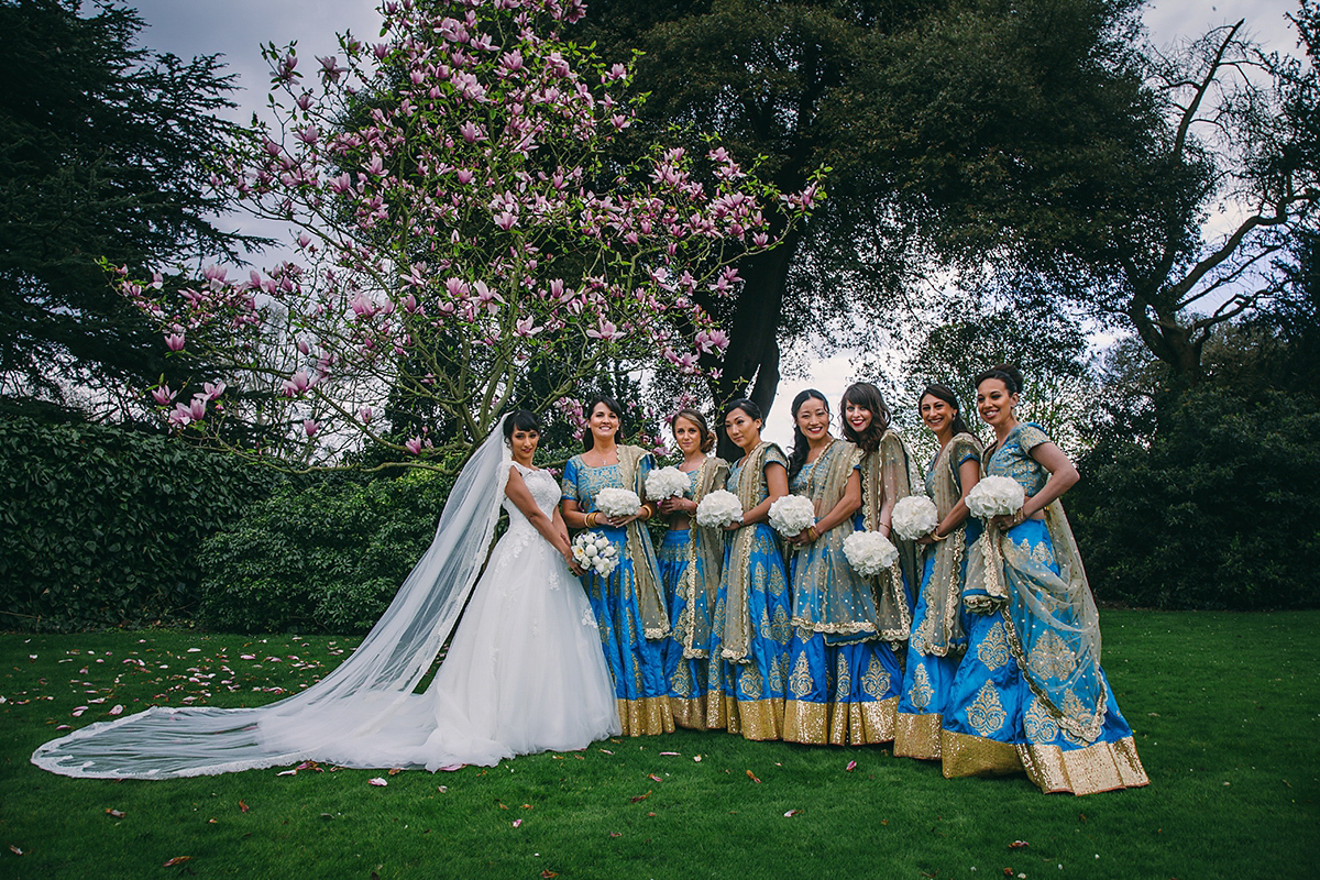 Sabrina and Nick had a multicultural wedding including an Anglican and Hindu ceremony at Syon Park in London. Sabrina wore Pronovias. Photography by Viva La weddings.